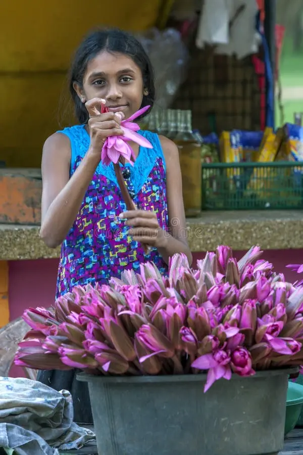 Girl Selling Lotus Flowers